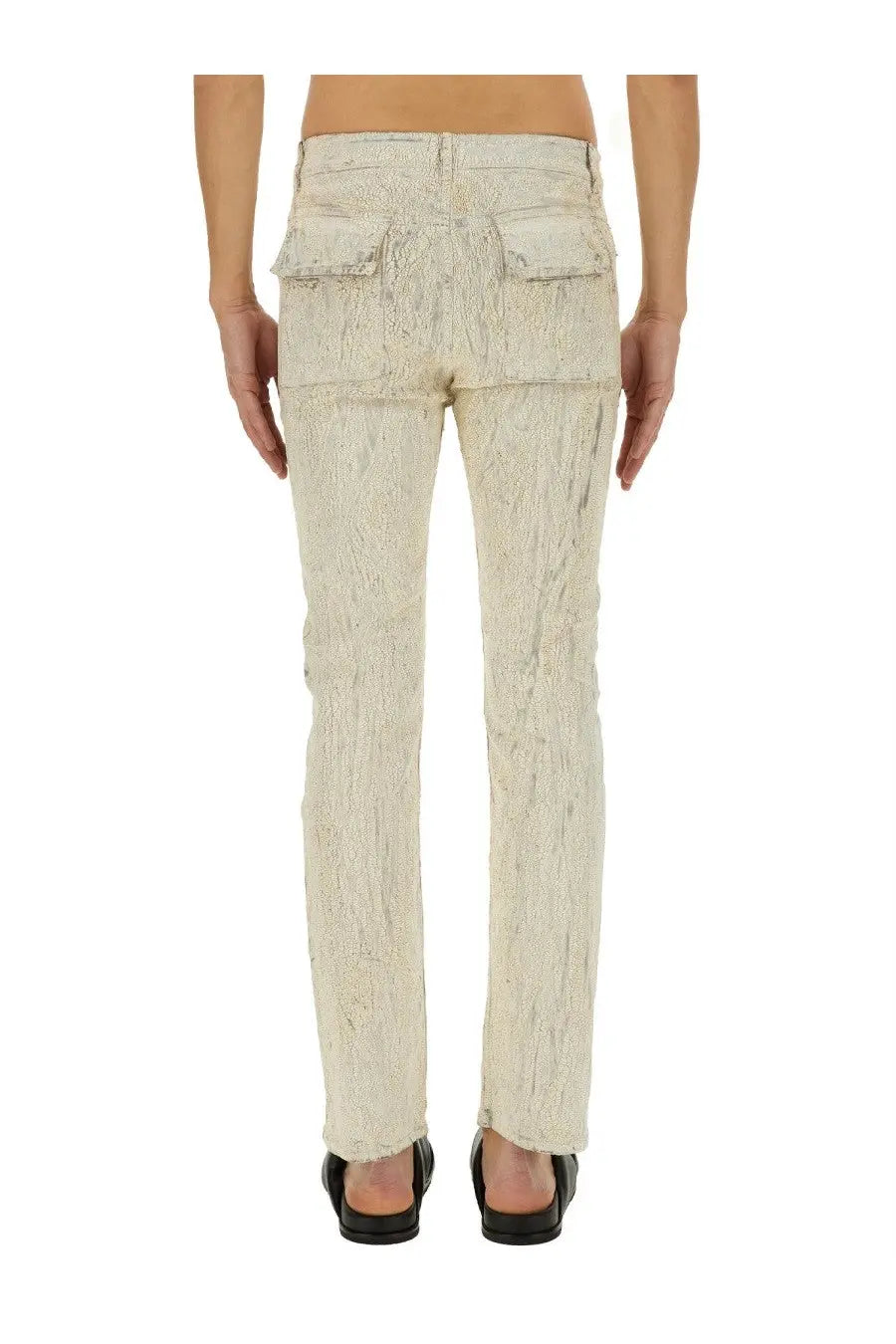 Rick Owens men’s beige distressed denim pants with textured worn-in appearance and two front pockets