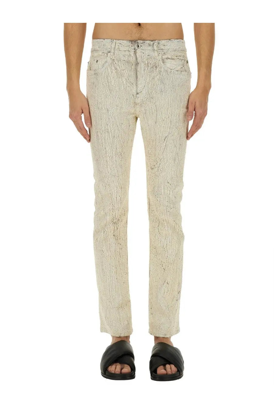 Rick Owens men’s cream-colored denim pants with a subtle textured pattern in headon utility white color