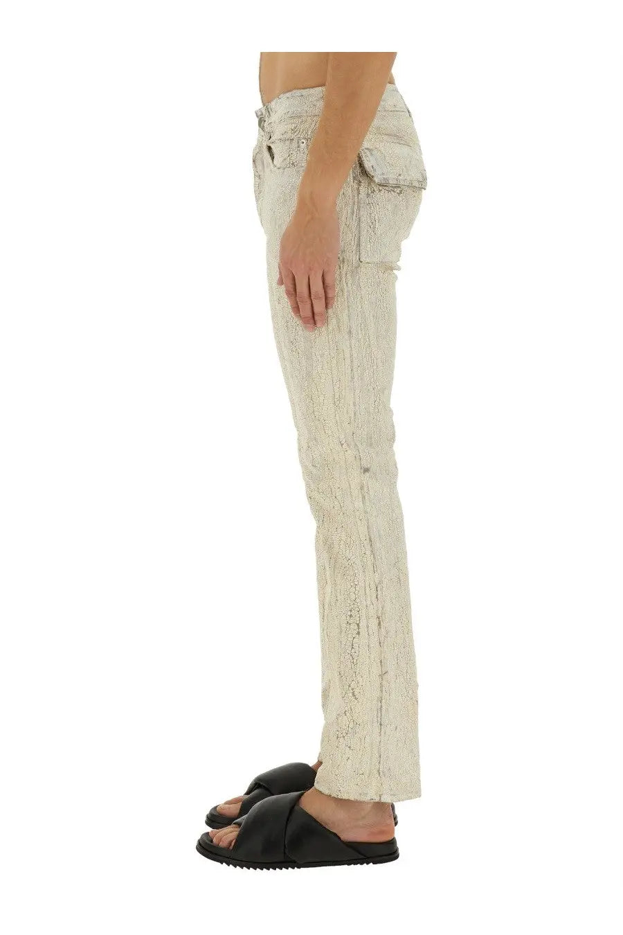 Rick Owens men’s off-white distressed denim pants with lace-like pattern and decorative stitching in utility style