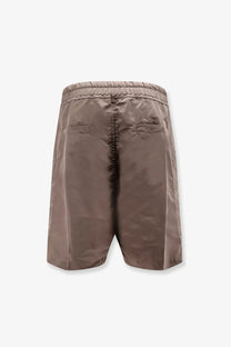 Back view of rick owens men’s grey recycled nylon shorts with elastic waistband and two back pockets