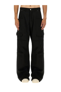 Rick Owens men’s Stefan black wide-leg cargo pants with multiple flap pockets and button closure