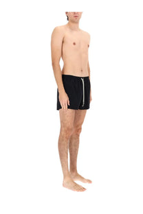 Rick Owens men’s black swim trunks with a white zipper pull and drawstring for stylish beachwear