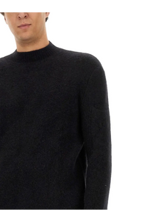 Rick Owens men’s black ribbed knit turtleneck sweater made from wool jersey for stylish warmth and comfort