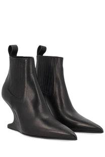 Rick Owens women’s black leather ankle sharp boot with sculpted wedge heel and ribbed elastic side panels