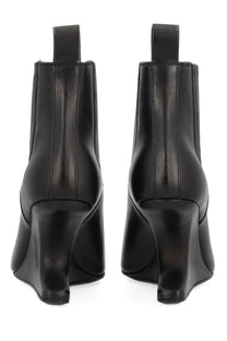 Rick Owens women’s black leather ankle sharp boots with sleek modern wedge heel and elastic side panels