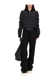 Rick Owens women’s black quilted puffer jacket with structured shoulders and silver zipper down bomber jacket