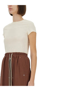 Cream-colored Rick Owens women’s cropped shirt with short sleeves and a simple round neckline in white