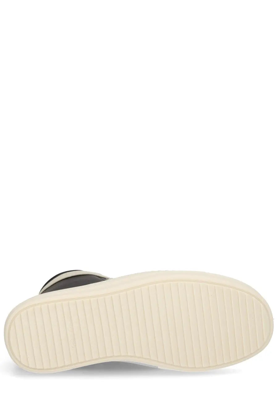 Black high-top leather sneaker for women by rick owens with cream rubber sole featuring vertical grooves visible from back