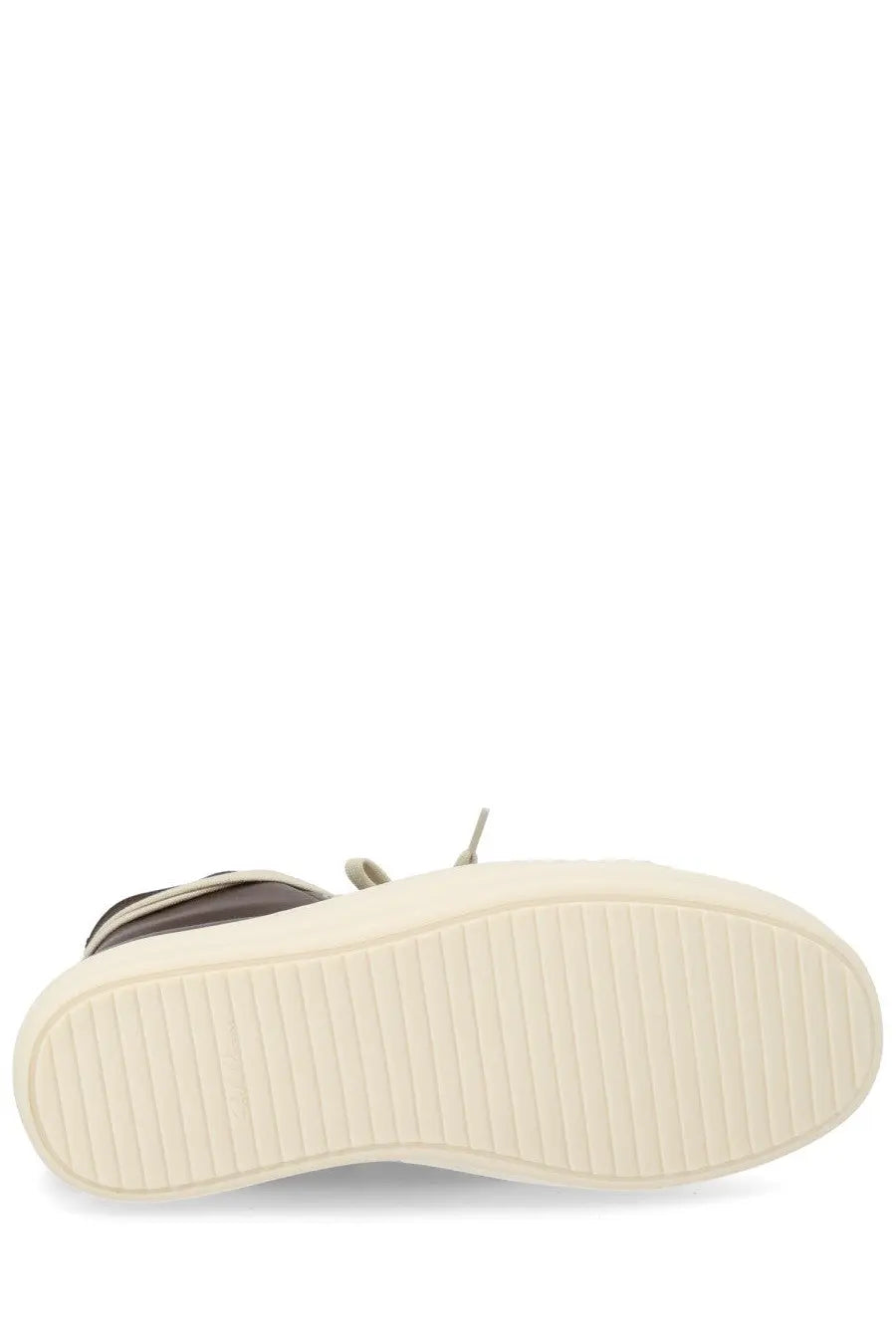 Cream-colored rubber sole with vertical grooves on dark brown leather rick owens women’s high-top sneaker