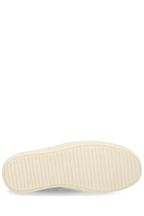 Cream-colored rubber sole with textured ribbed pattern on the back of rick owens women’s low sneaks sneaker black