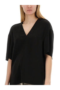 Rick Owens women’s black v-neck blouse with relaxed fit and short sleeves in lightweight fabric