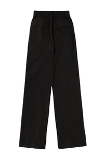 Back view of rick owens women’s black wide-leg trousers with elastic waistband and two rear pockets