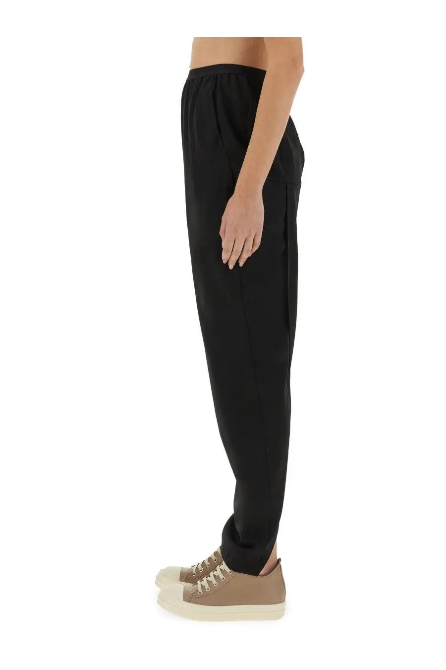 Rick Owens women’s black high-waisted trousers with relaxed fit and tapered legs in soft fabric