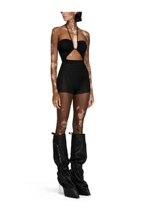 Black satin over-the-knee boots with sleek high heel and ruched cuffs from Rick Owens women’s collection