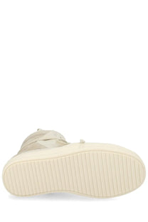 Cream-colored Rick Owens women’s Geobasket sneaker with high-top design, textured rubber sole, and subtle stitching details