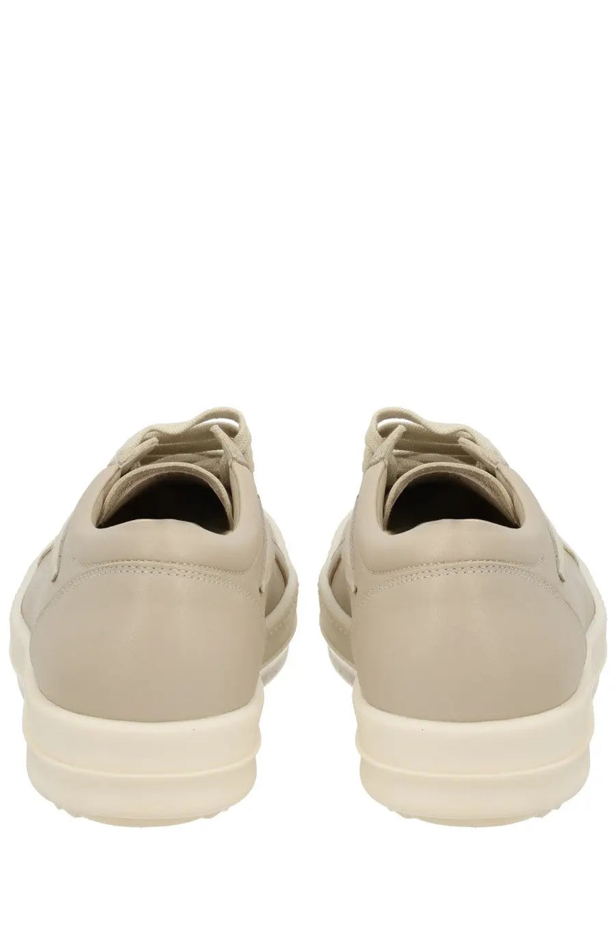 Beige leather low-top sneakers with white rubber sole and matching laces from Rick Owens women’s vintage sneaks