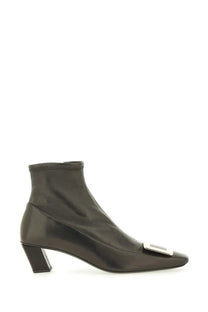 Roger Vivier women’s black leather ankle boot with square heel and silver rectangular buckle at the toe