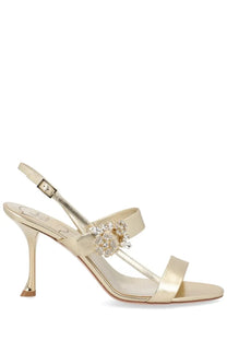 Roger Vivier women’s gold satin sandal with delicate ankle strap and crystal flower embellishment across the foot