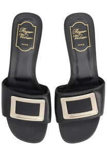 Roger Vivier women’s black leather slide sandals with a silver-toned rectangular buckle front detail