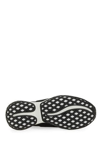 Black and white Roger Vivier women’s sneaker viv run sole with diamond patterned tread design