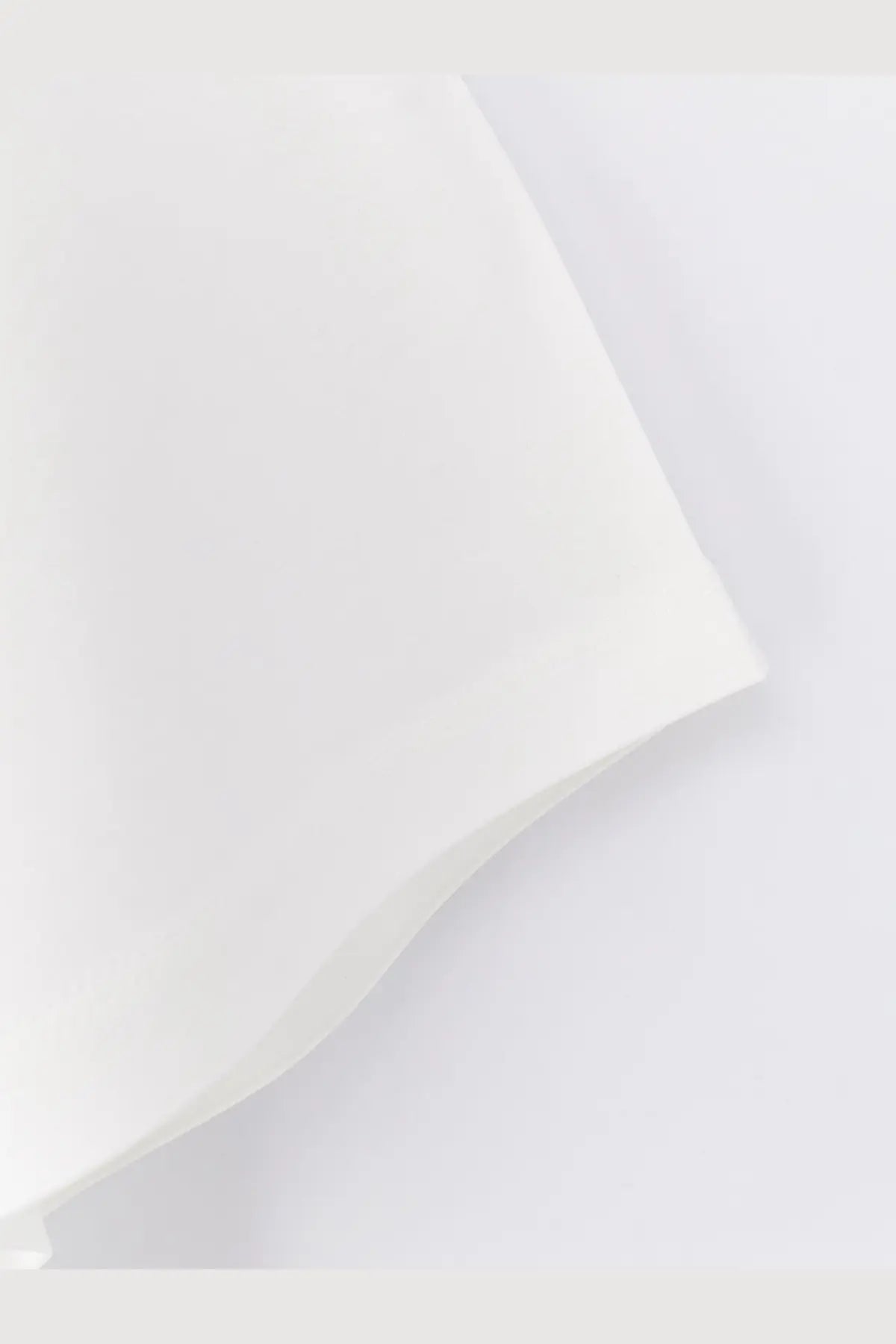 Rohe women’s cotton blend shirt in white featuring soft off-white fabric with smooth texture and gentle folds