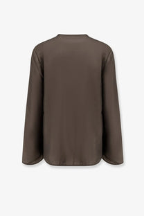 A sleek muted brown Rohe women’s long-sleeved silk top with mandarin closure and subtle shoulder seams