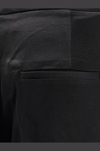 Rohe women’s relaxed satin trousers in black featuring sleek satin fabric with smooth texture and subtle sheen