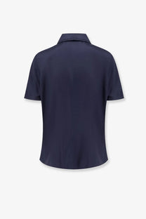 Rohe women’s silk black shirt with navy blue short sleeves and subtle textured collar trim for elegant wear