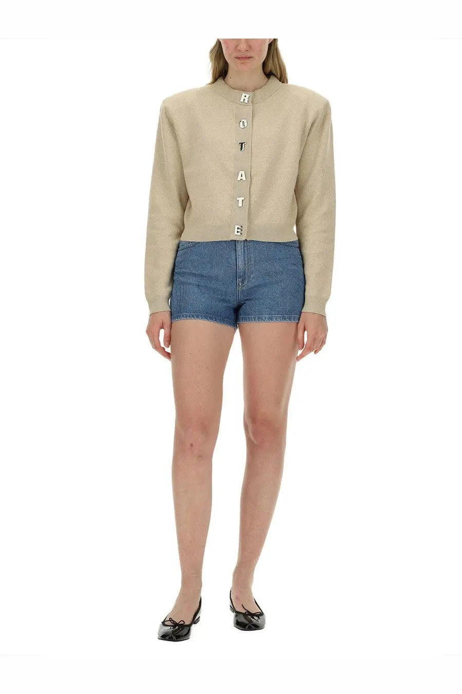 Beige cropped cardigan with lettered buttons spelling rotate paired with Rotate Birger Christensen women’s blue denim shorts