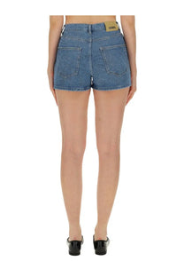 Rotate Birger Christensen women’s blue denim shorts with five-pocket design and brown leather brand patch at the waistband