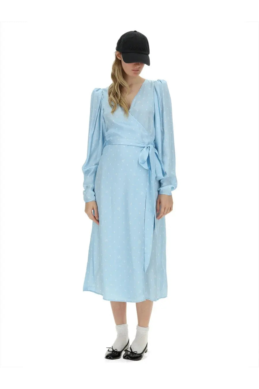 Light blue wrap dress with subtle white polka dots and puffed sleeves by Rotate Birger Christensen women’s dress blue