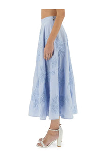 Rotate Birger Christensen women’s light blue flowing midi skirt with delicate floral embroidery along its length