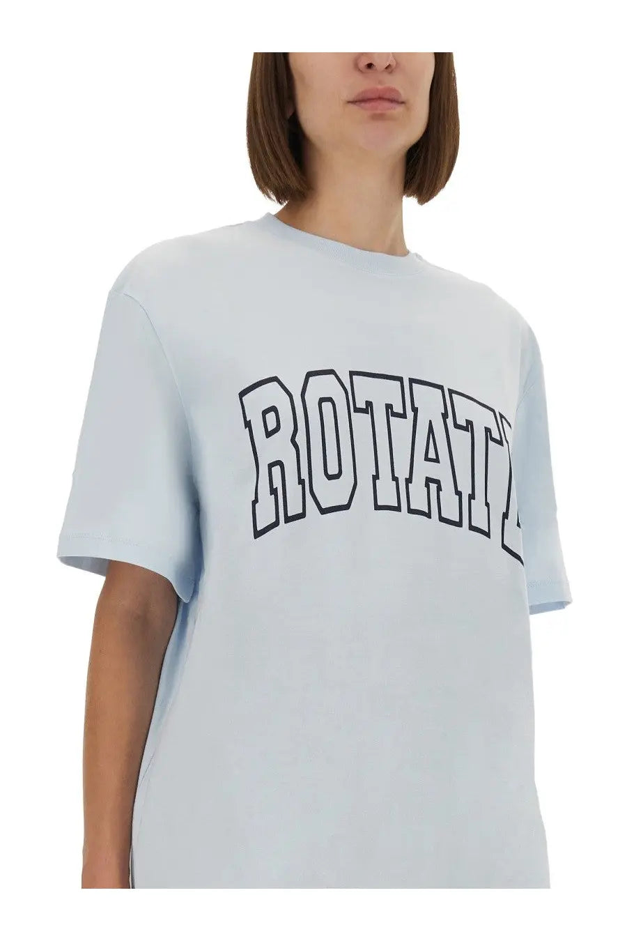 Light blue oversized jersey shirt by Rotate Birger Christensen with bold black arched lettering on the chest