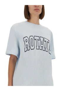 Light blue oversized jersey shirt by Rotate Birger Christensen with bold black arched lettering on the chest