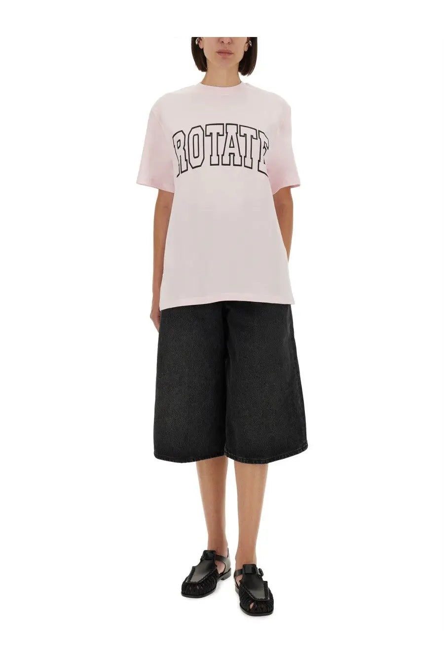 Rotate Birger Christensen women’s soft pink oversized jersey shirt with bold black arched lettering on the chest