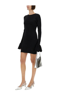 Silver metallic hobo bag with sleek minimalist design and structured shape featured with rotate birger christensen dress