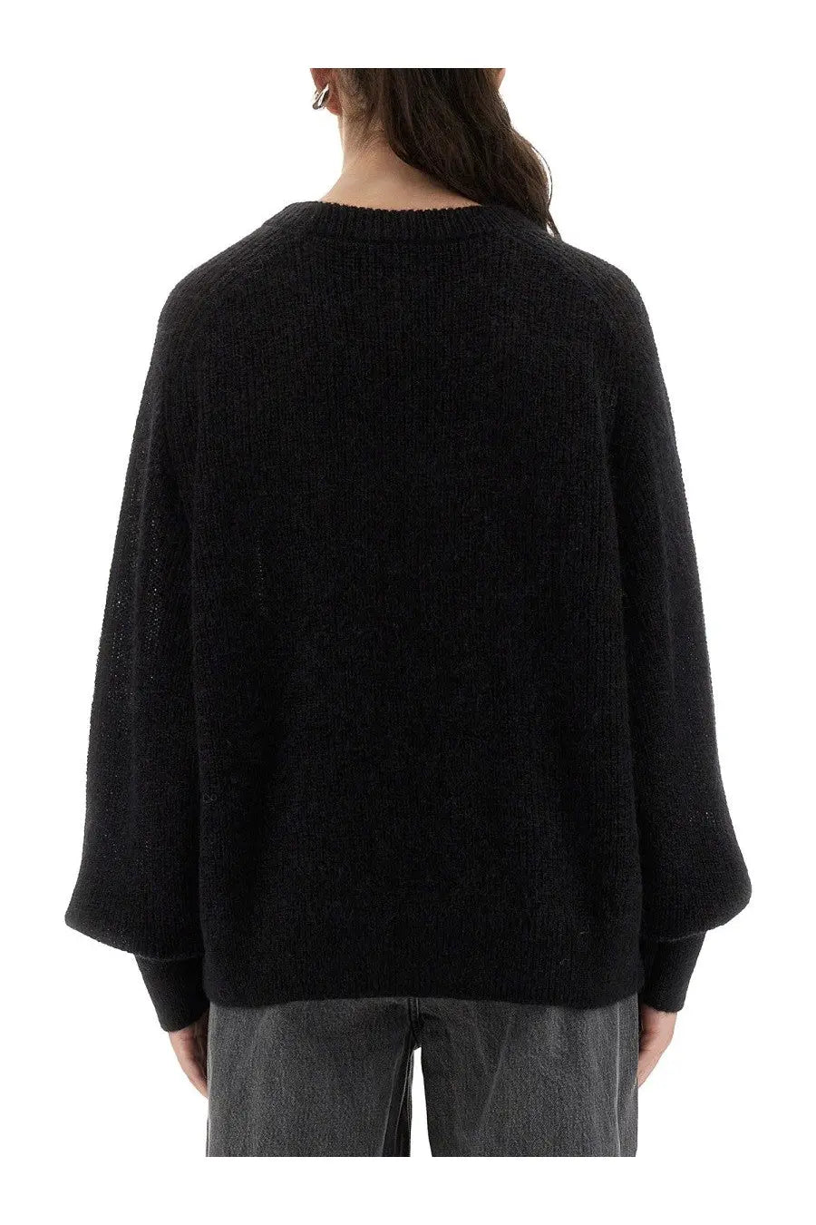 Black textured knit sweater with loose fit and bell sleeves from Rotate Birger Christensen women’s lightweight jersey collection