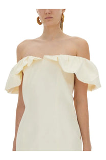Cream-colored off-the-shoulder mini dress with voluminous ruffled sleeves by Rotate Birger Christensen