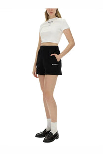 Black rotate shorts with white branding on front and side pockets for women by rotate birger christensen