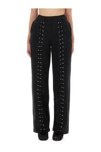 Rotate Birger Christensen women’s black high-waisted sports pants with silver eyelets and lacing down each leg