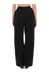 Rotate Birger Christensen women’s black high-waisted wide-leg sports pants with a sleek minimalist design