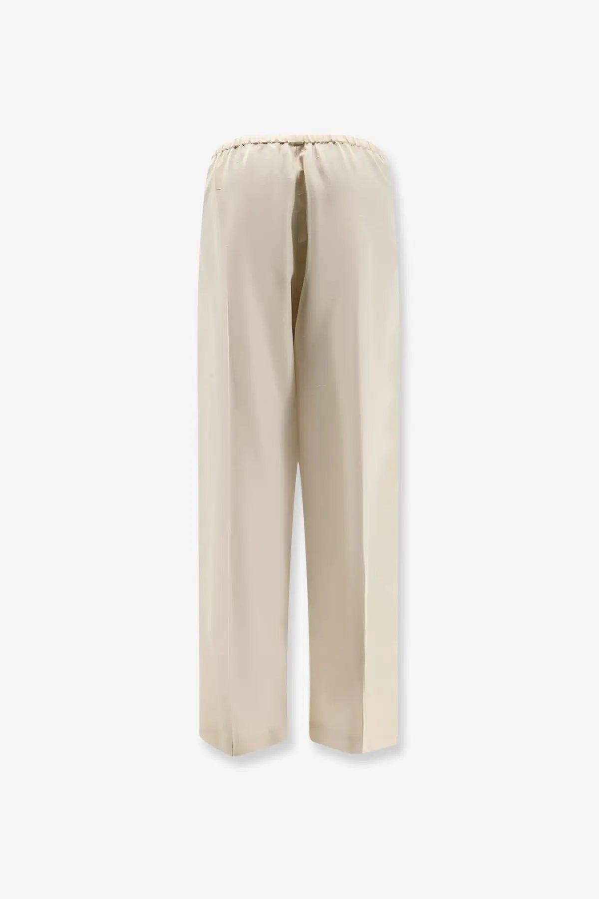 The Row women’s Beta silk trousers in beige feature wide-leg design and an elastic waistband with flowing fabric