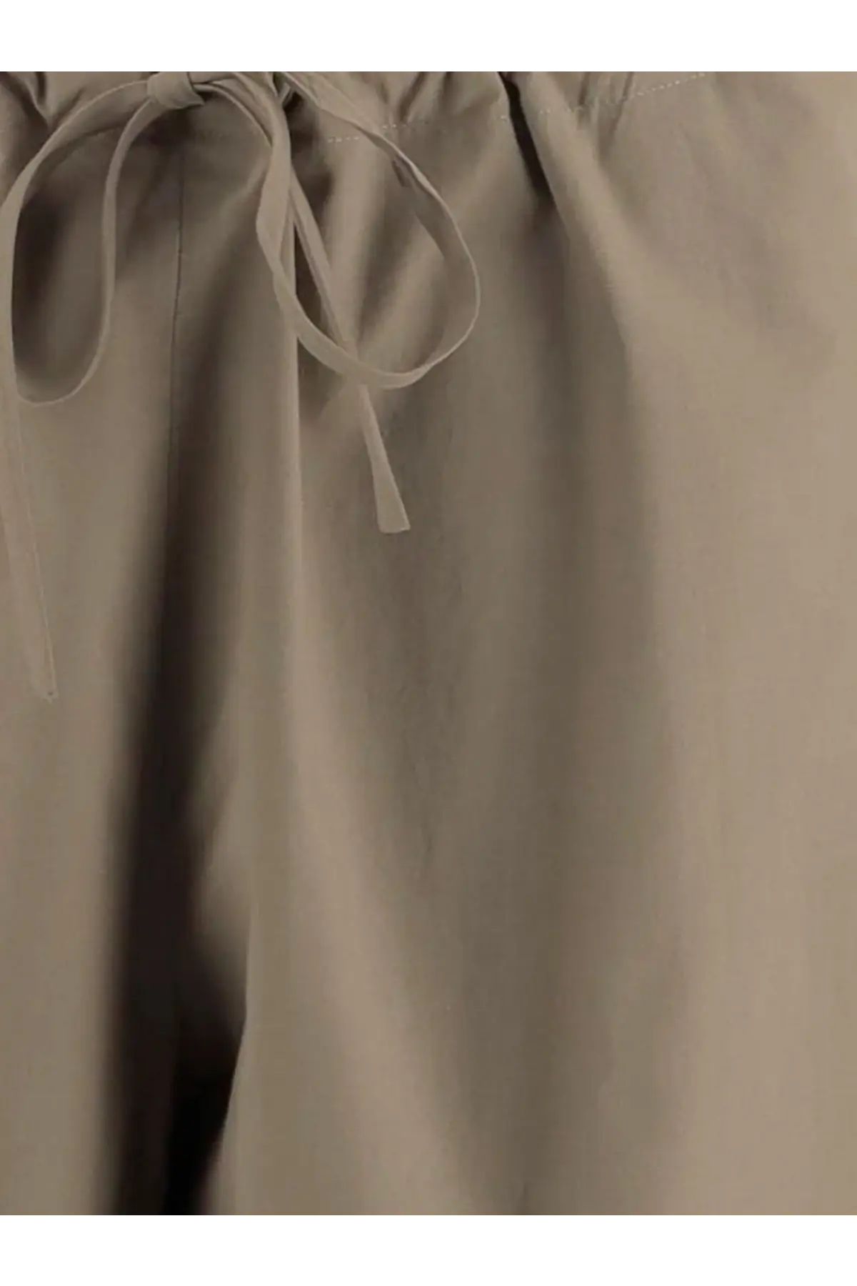 The row women’s delano cotton trousers green beige drawstring pants with soft flowing fabric and matching waist ties