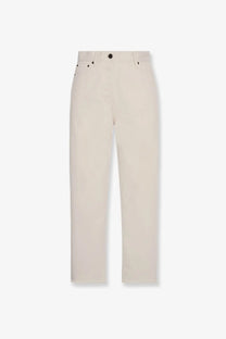 The row women’s fortino cream-colored straight-leg organic cotton trousers with black button accents and minimalist design
