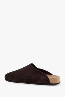 The row women’s hudson two brown suede slip-on mule sandal with a light tan cork footbed and black rubber sole