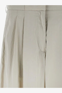 Beige pleated trousers with subtle stitching details from The Row womens Iven silk and nylon trousers grey collection