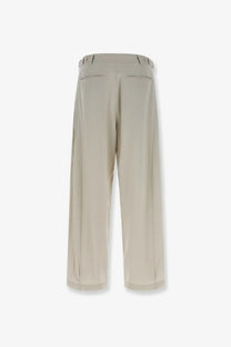 Beige wide-leg trousers with tailored fit and subtle back pleats from the row women’s iven silk and nylon grey trousers