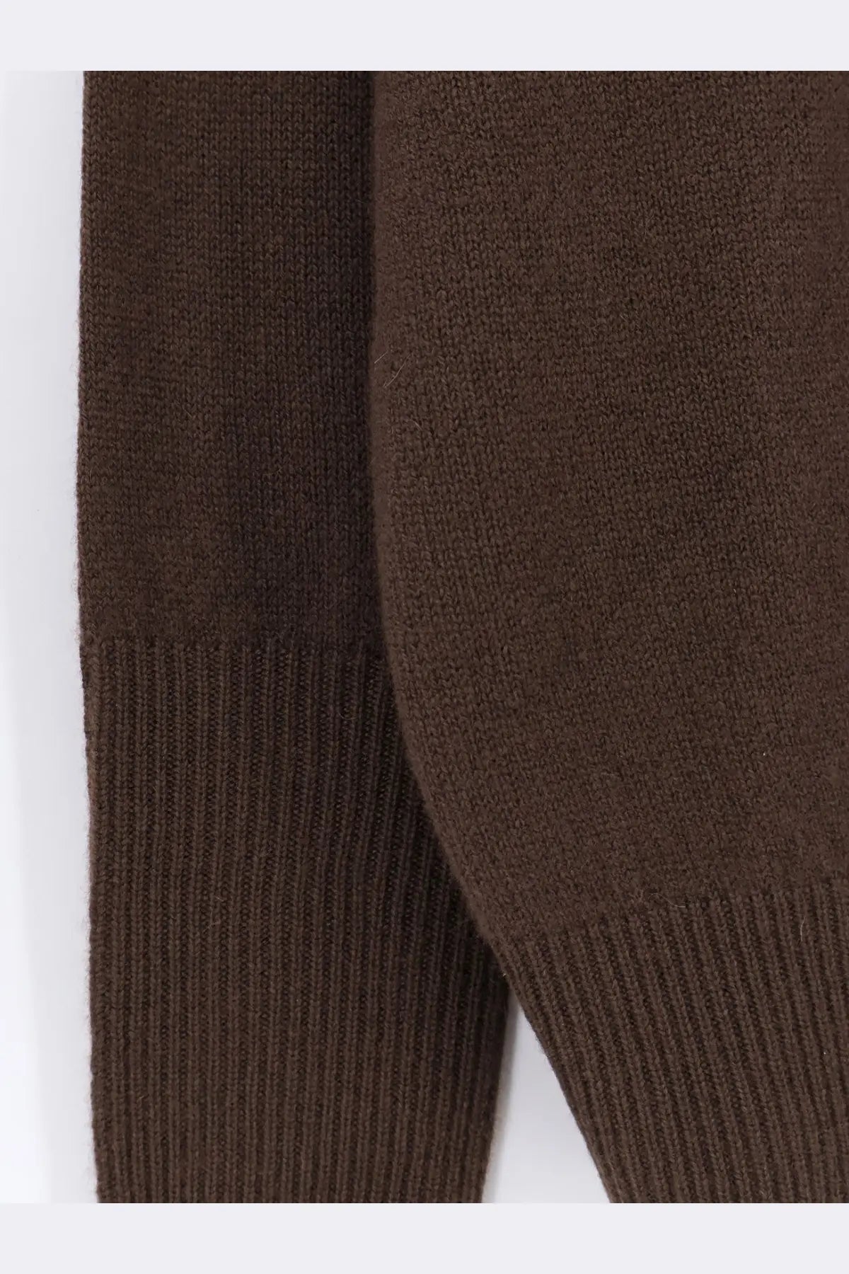 The row women’s odelle top cashmere sweater brown showing brown knitted sleeve with ribbed cuffs