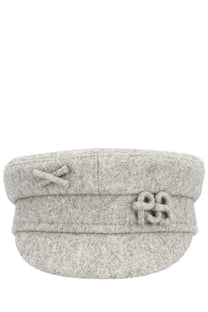 A soft gray woolen ruslan baginskiy women’s baker boy hat with a structured brim and knotted embellishments