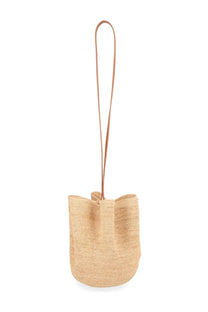 Beige woven straw bucket bag with matching leather handle ruslan baginskiy womens borsa the hatbag beige